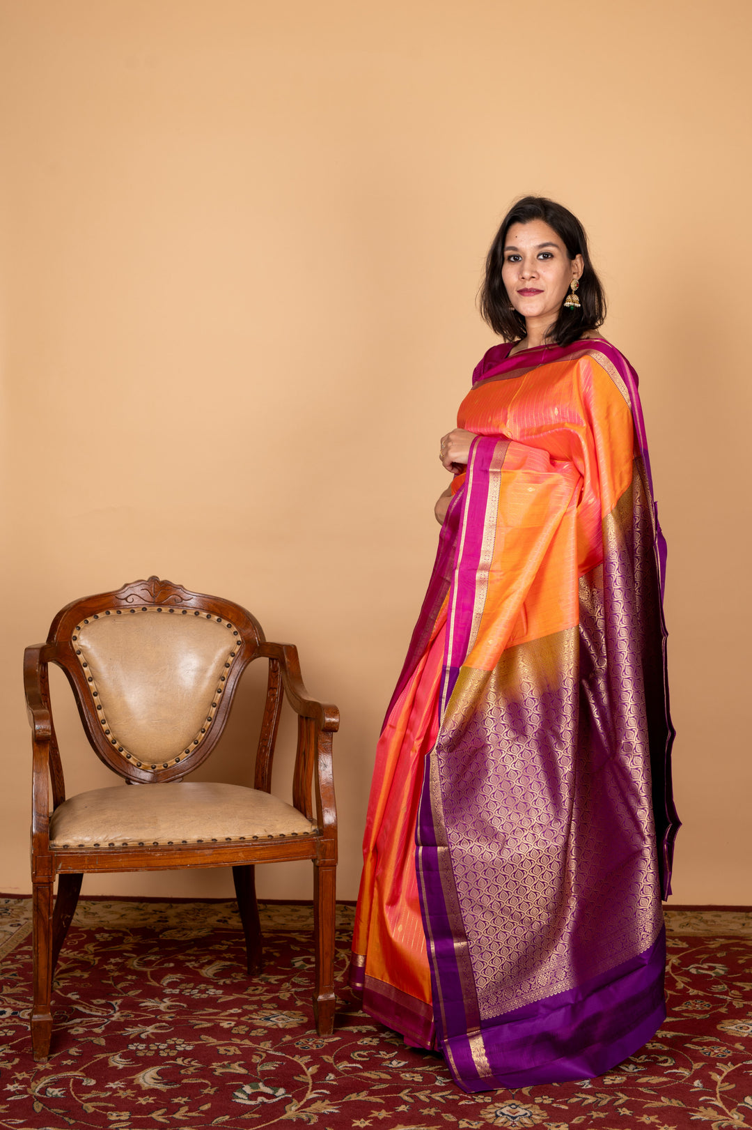 Dual tone orange small border silk saree