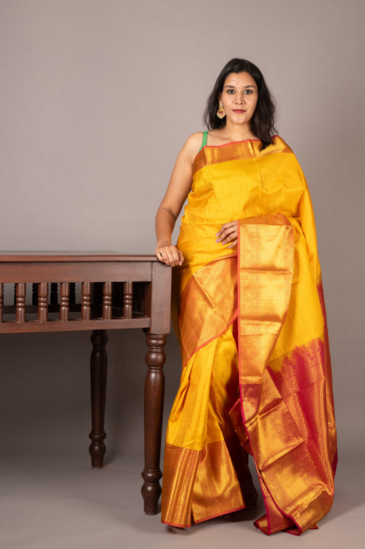 Yellow and pink pattu saree