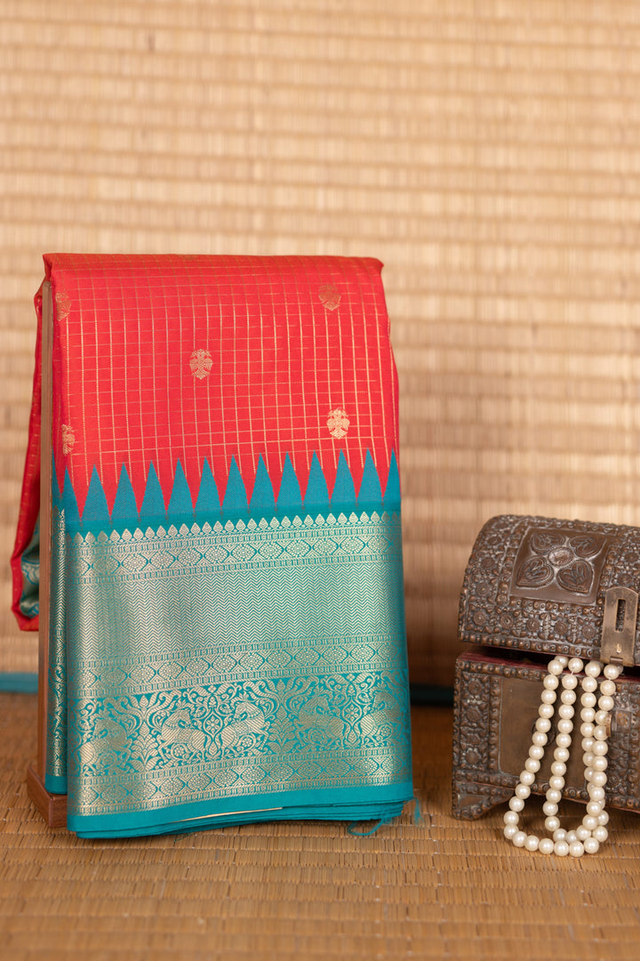 Teal and orange semi silk saree