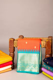 Teal and orange semi silk saree