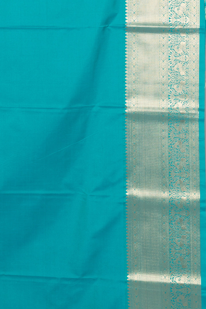 Teal and orange semi silk saree