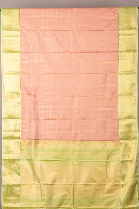 Pastel peach and green soft silk saree