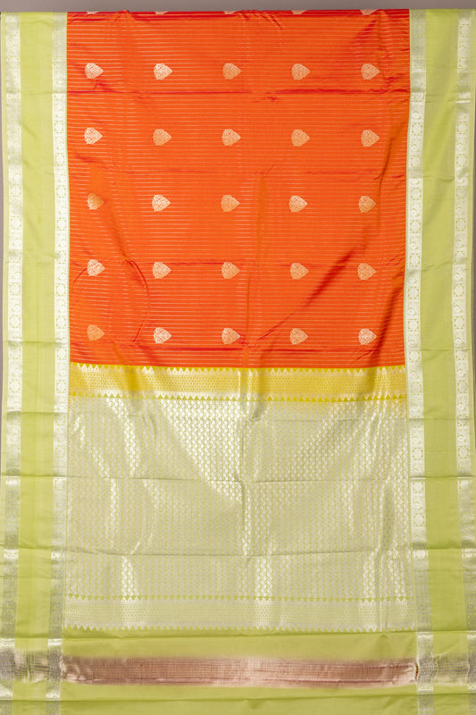 Golden orange and pastel green semi silk saree