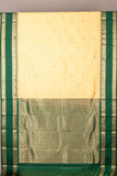 Offwhite and emerald greem semi saree