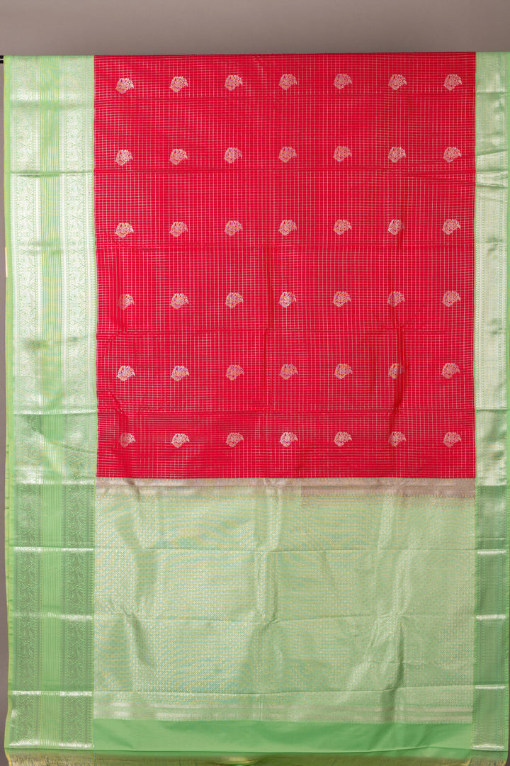 Aqua green and reddish pink semi silk saree