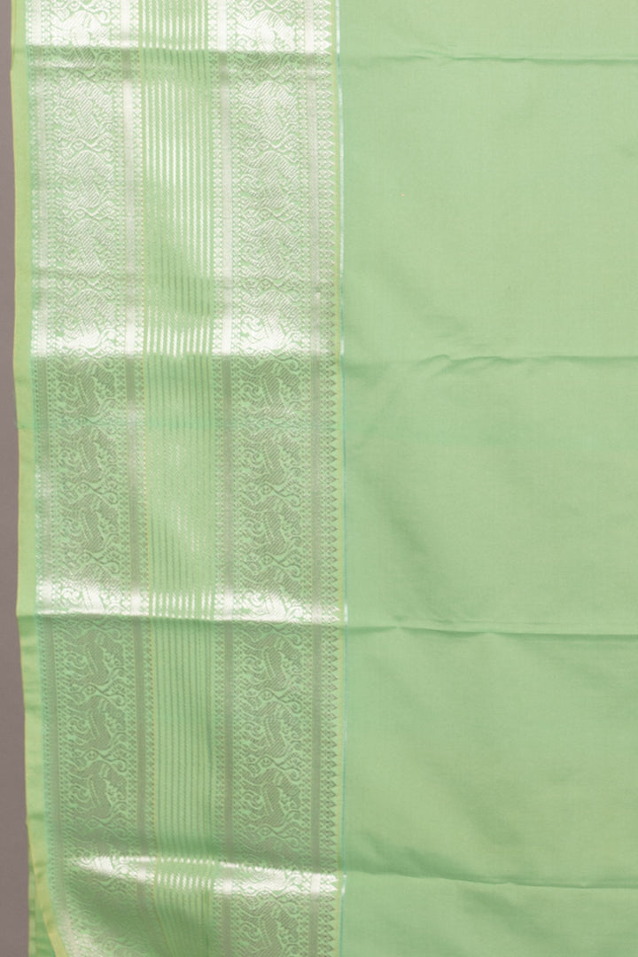 Aqua green and reddish pink semi silk saree