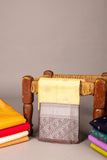 Offwhite and chocolate pure touch silk saree  Please change