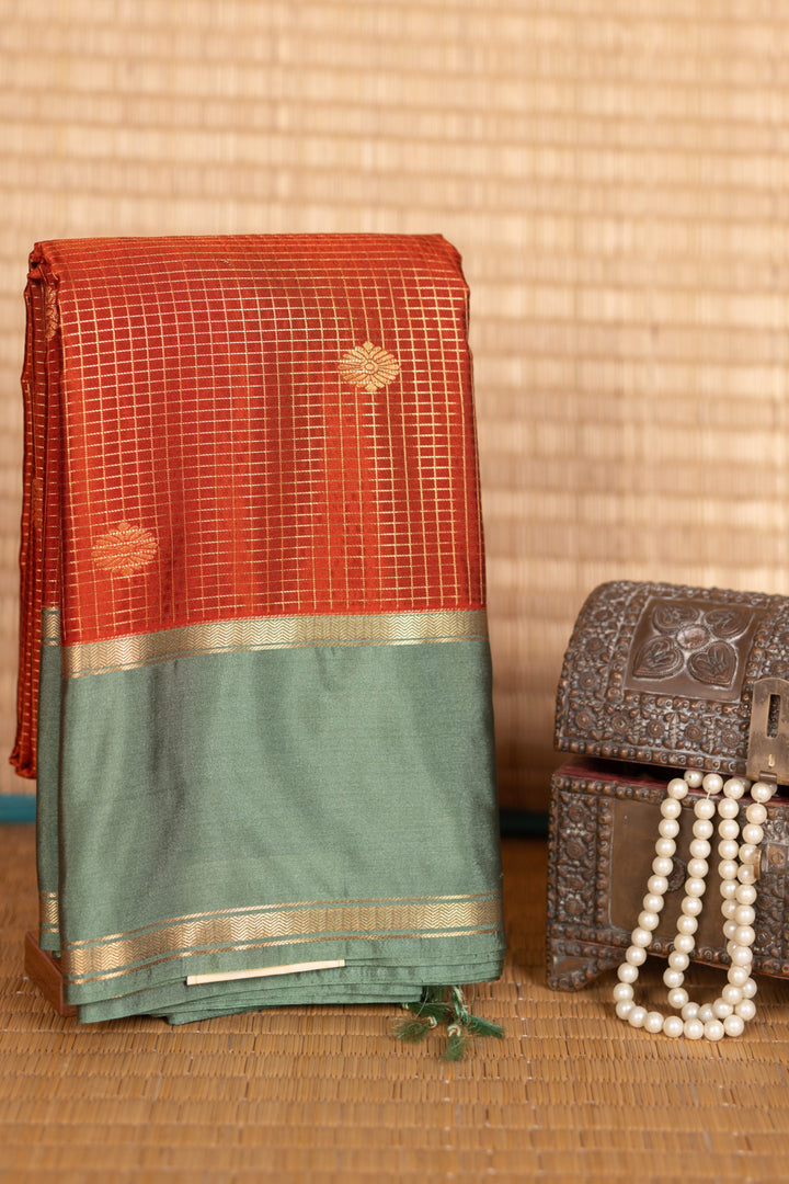 Rust Orange and Mint Green Semi Silk Saree