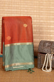 Rust Orange and Mint Green Semi Silk Saree