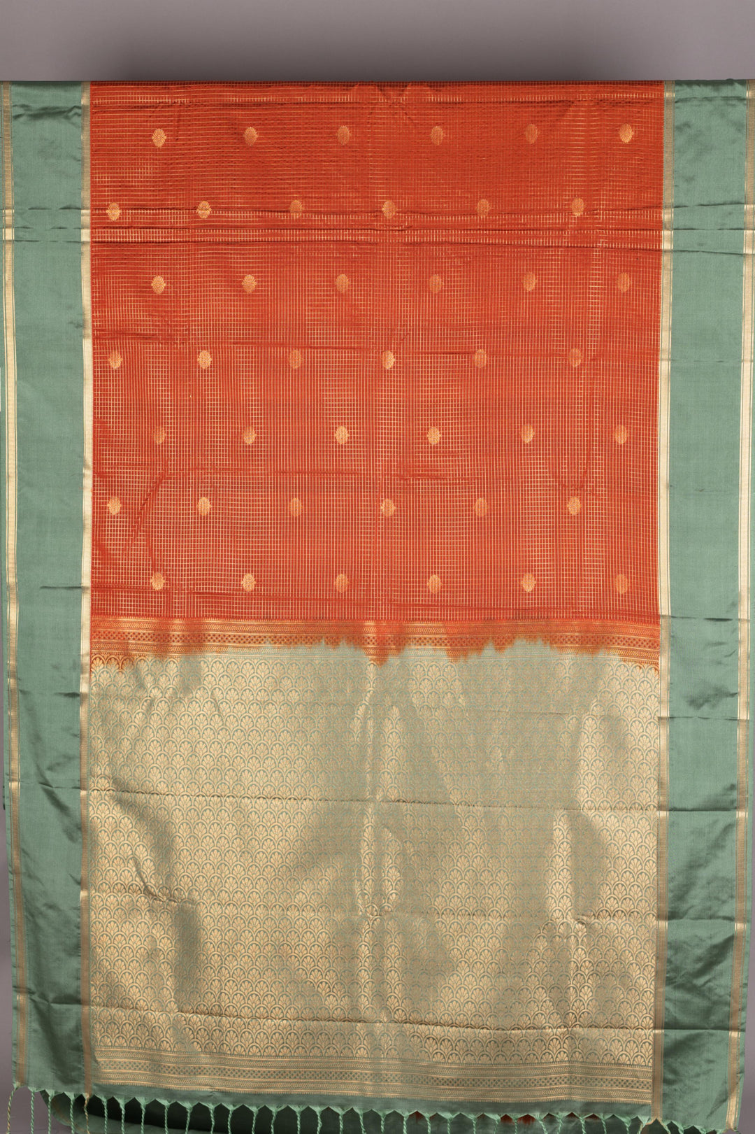 Rust Orange and Mint Green Semi Silk Saree