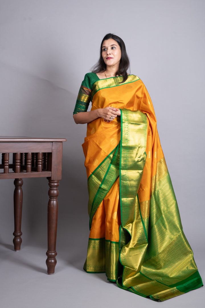 Turmeric Yellow and Forest Green Pure Kanjivaram Silk Saree