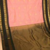 Salmon pink and Bottel green semi silk saree