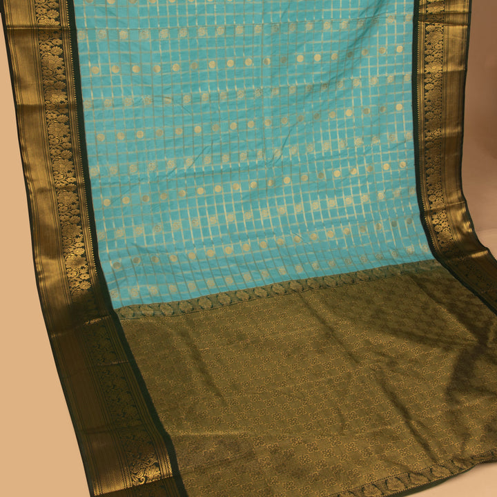 Electric blue and Bottle green semi silk saree