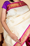 Offwhite and purple pure kanjivaram silk saree