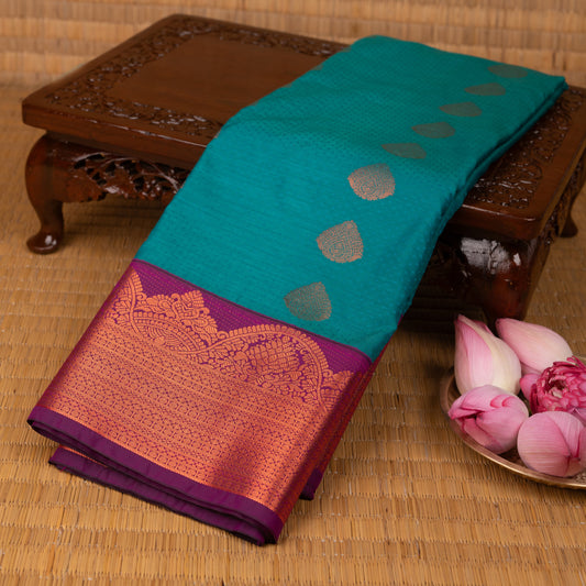 Peacock green and Brinjal purple semi silk saree