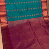 Peacock green and Brinjal purple semi silk saree
