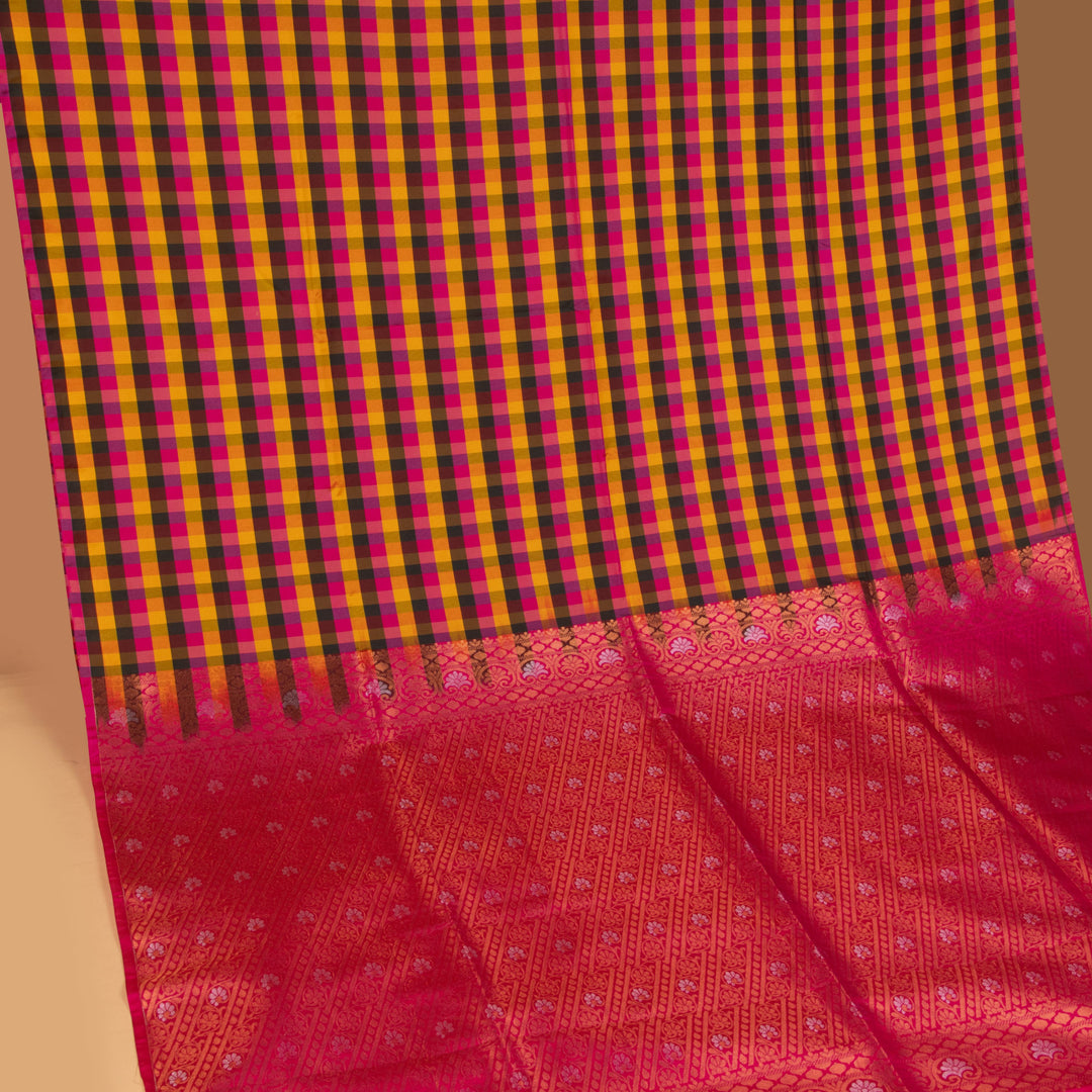 Multi colour checks and Rani pink soft silk saree