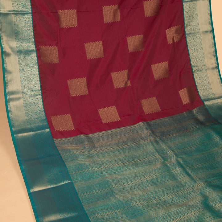 Maroon teal green semi silk saree