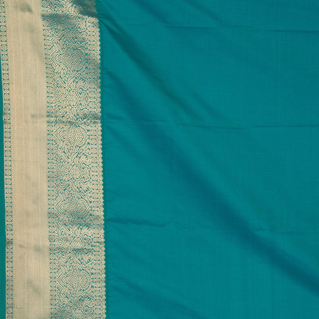 Maroon teal green semi silk saree