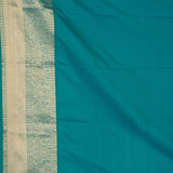 Maroon teal green semi silk saree