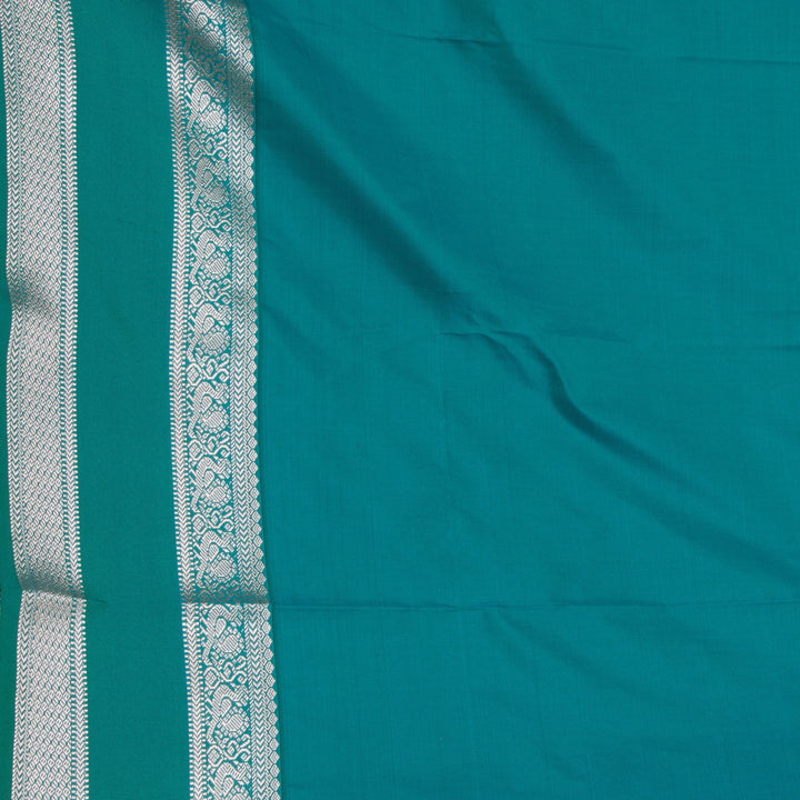 Maroon and Peacock green semi silk saree