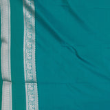 Maroon and Peacock green semi silk saree