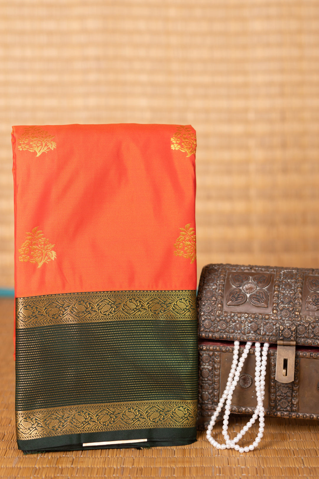 Neon Orange and Bottle green semi silk saree