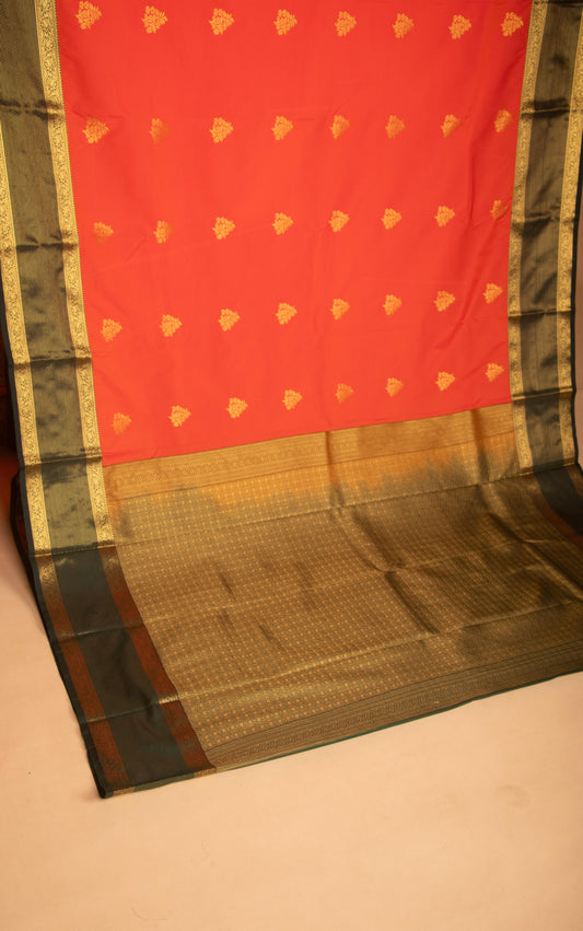 Neon Orange and Bottle green semi silk saree