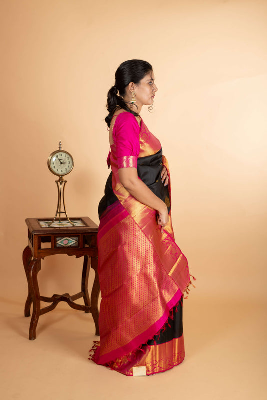 Black and pink combination silk saree.