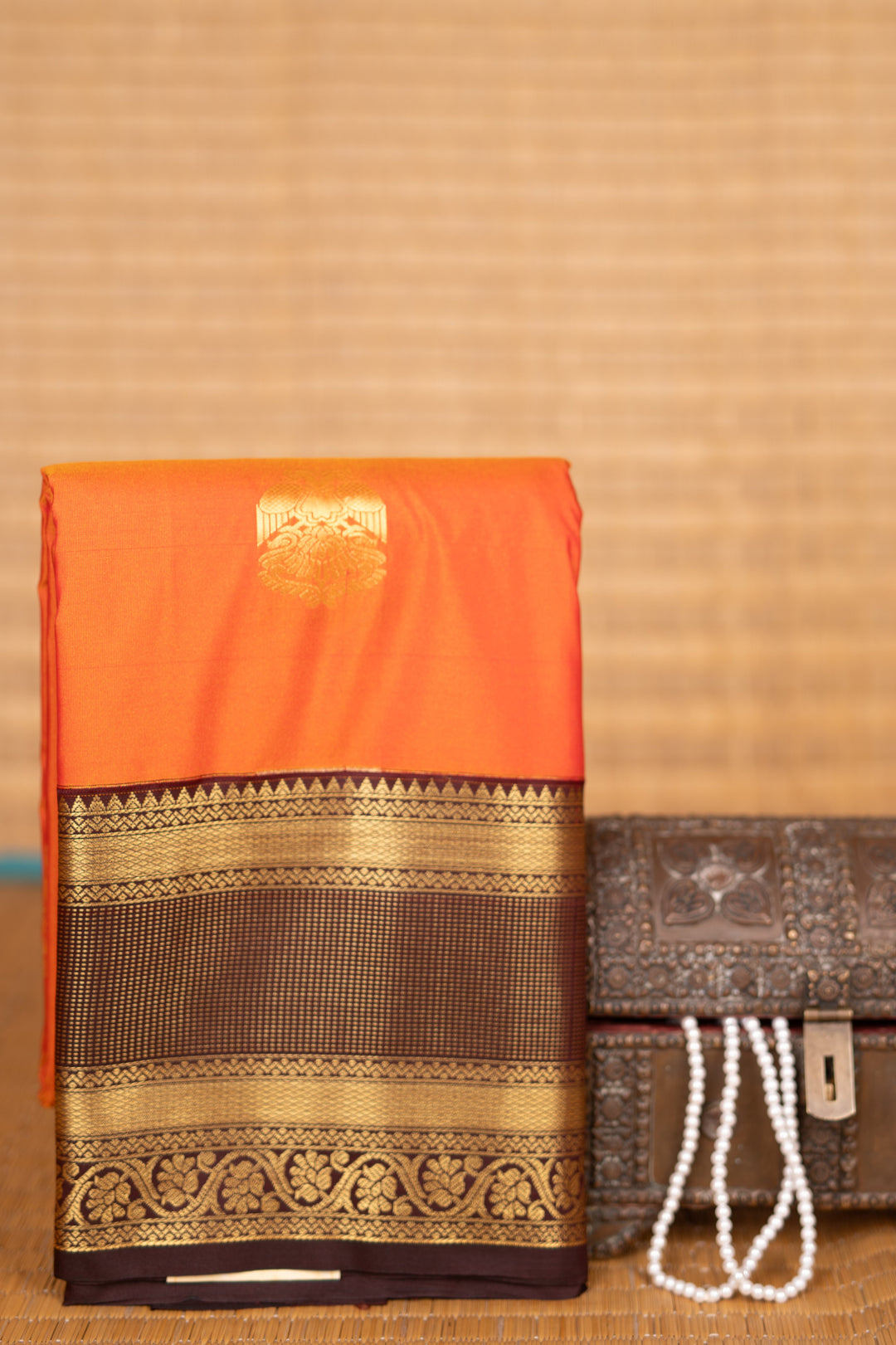 pumpkin orange and Chocolate Brown semi silk saree