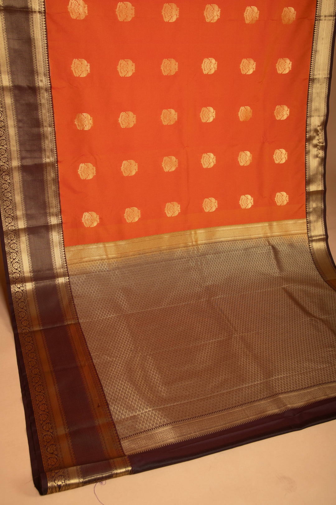 pumpkin orange and Chocolate Brown semi silk saree