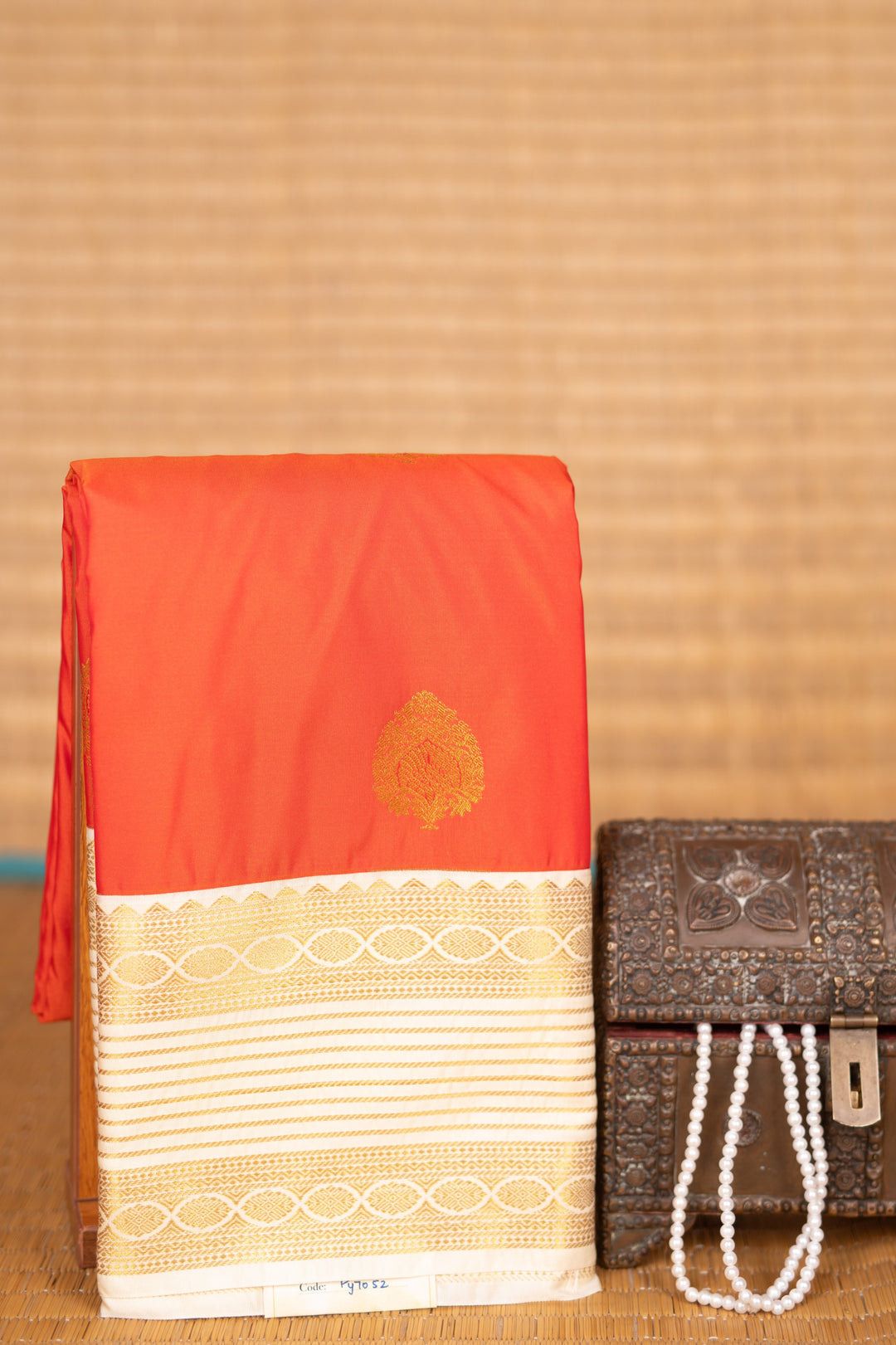 Persimmon orange and Offwhite semi silk saree