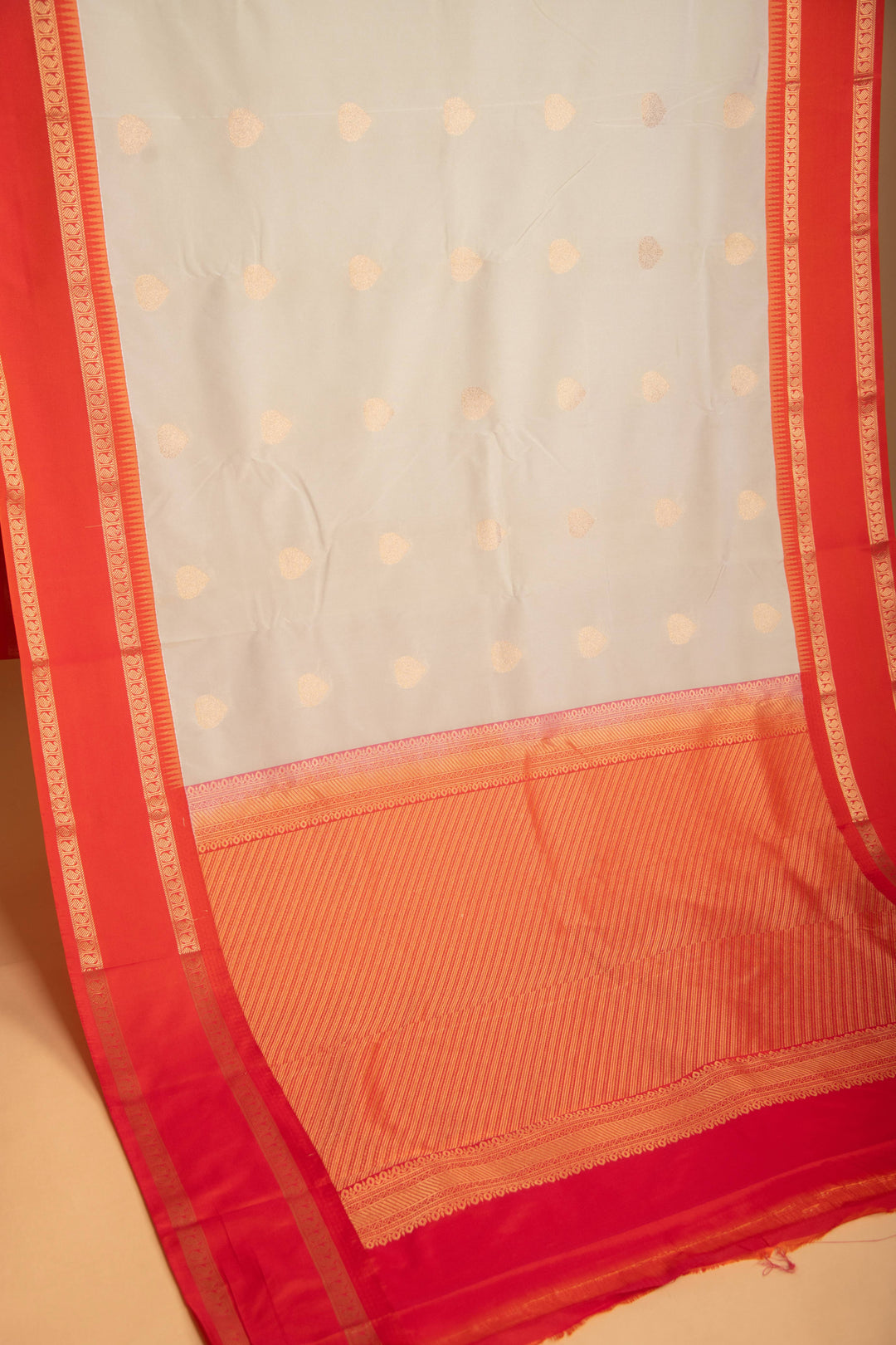 Pastel Green and Papaya Orange Koravi semi silk saree