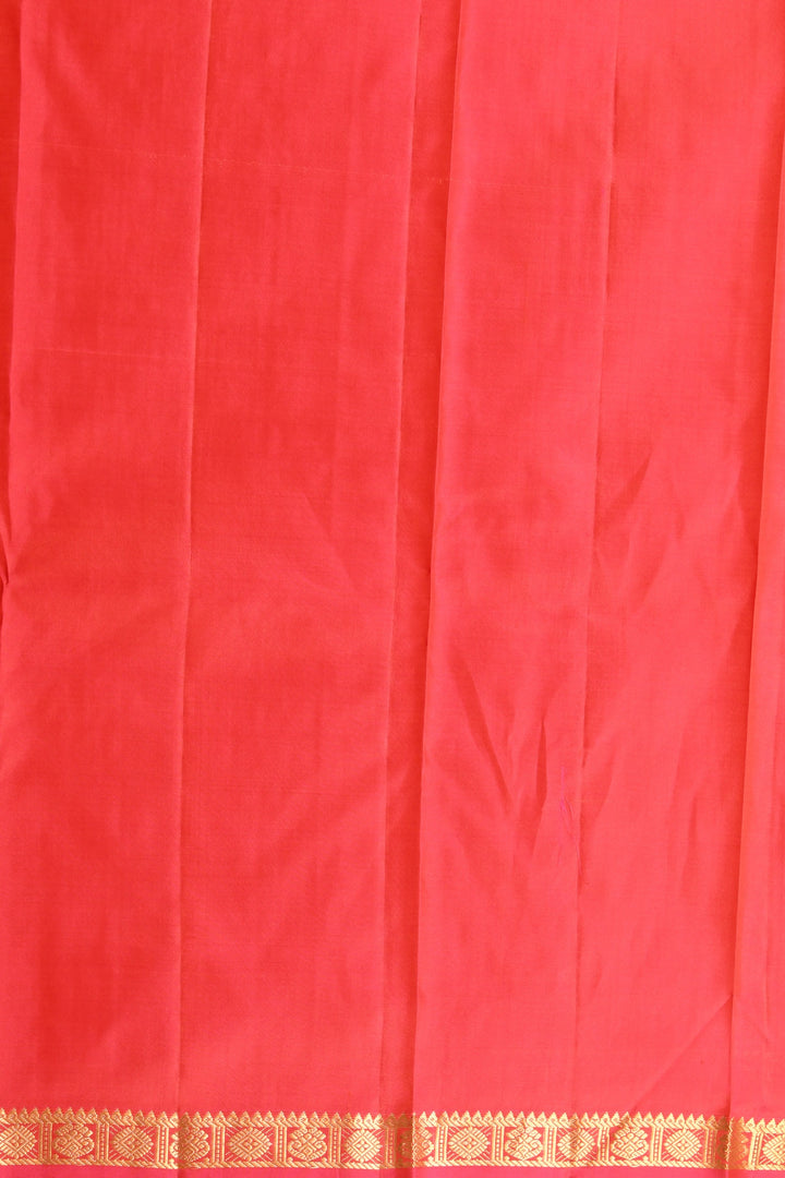 Dual tone orange and pink small border pure silk saree