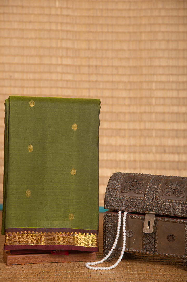 Kelly green and blood red small border pure kanchi silk saree