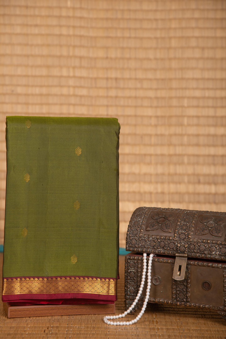 Kelly green and maroon small border pure kanchi silk saree