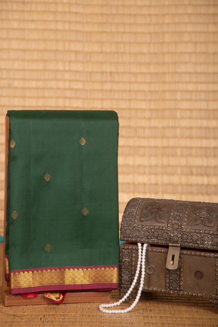 Dark green and purple small border pure kanchi silk saree