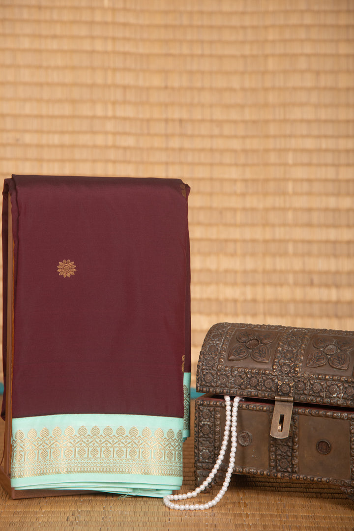Maroon and mint green semi silk saree