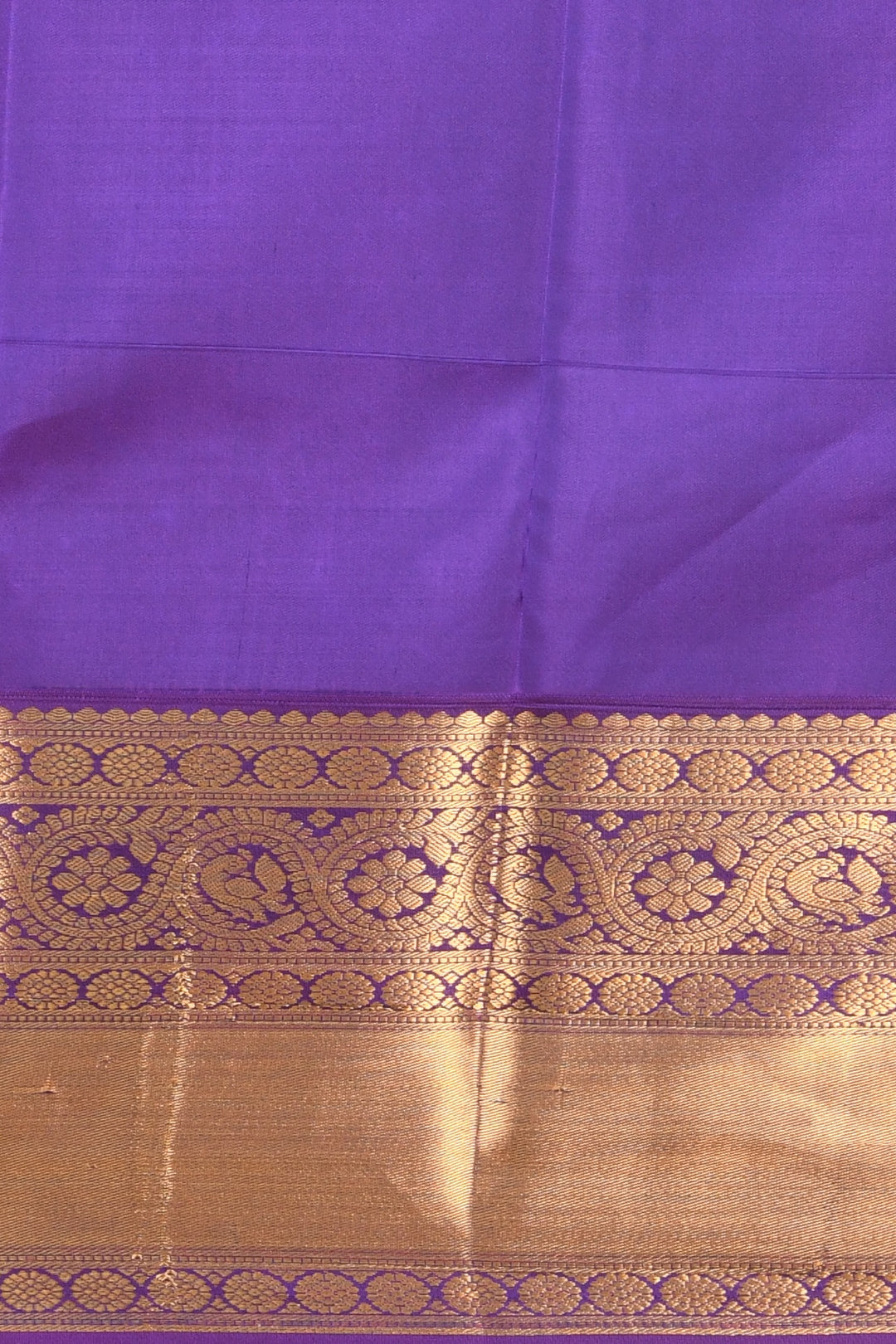 Peachish pink and purple bridal silk saree