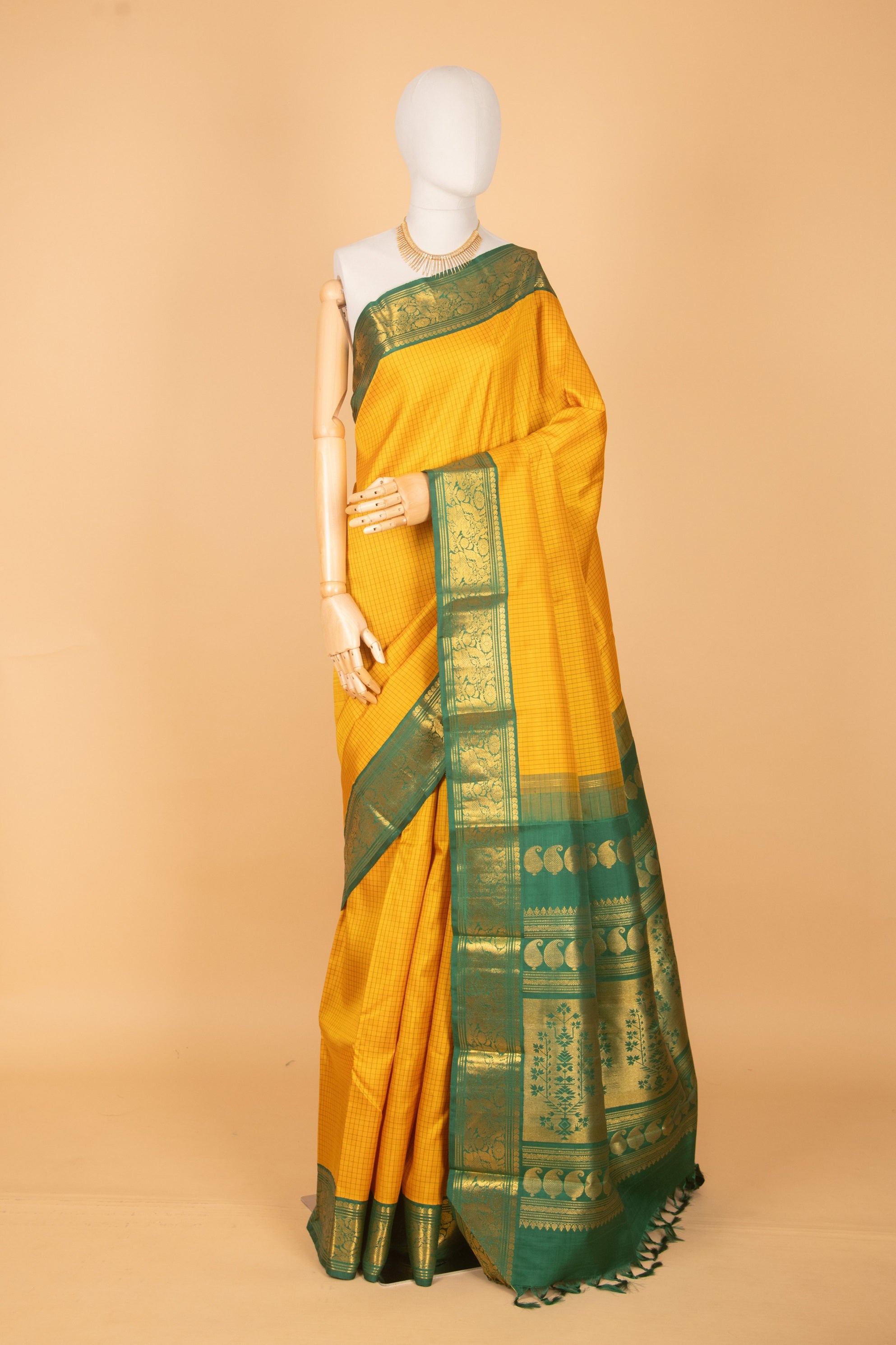 Golden yellow and green korvai traditional silk saree