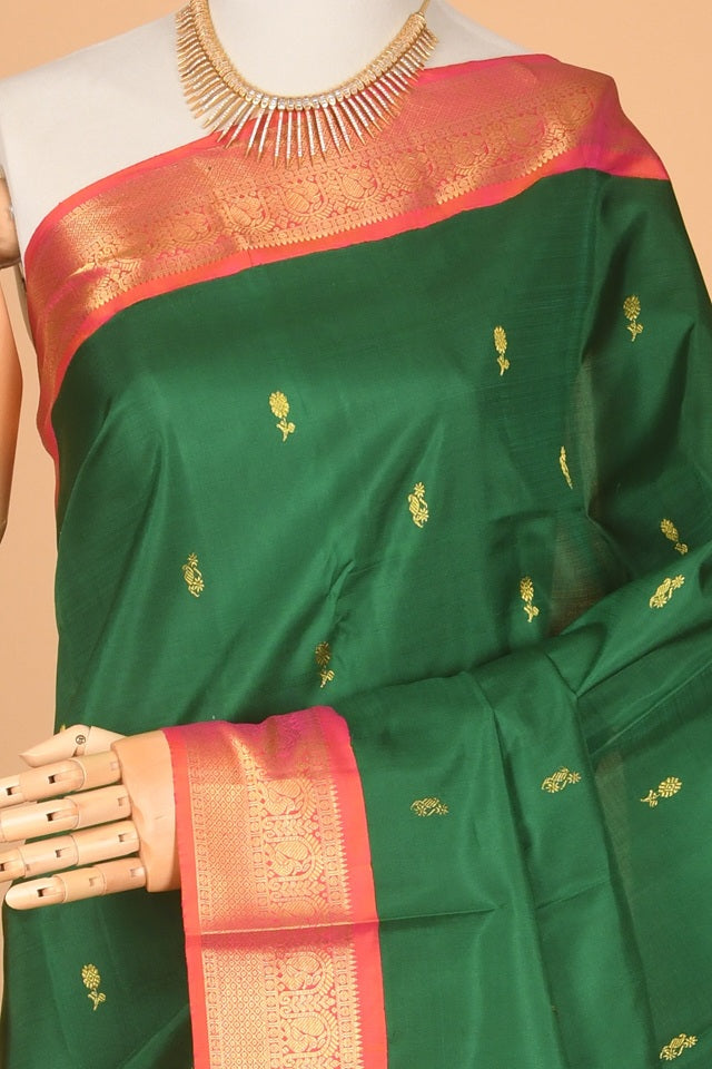 Green and orange korvai silk saree