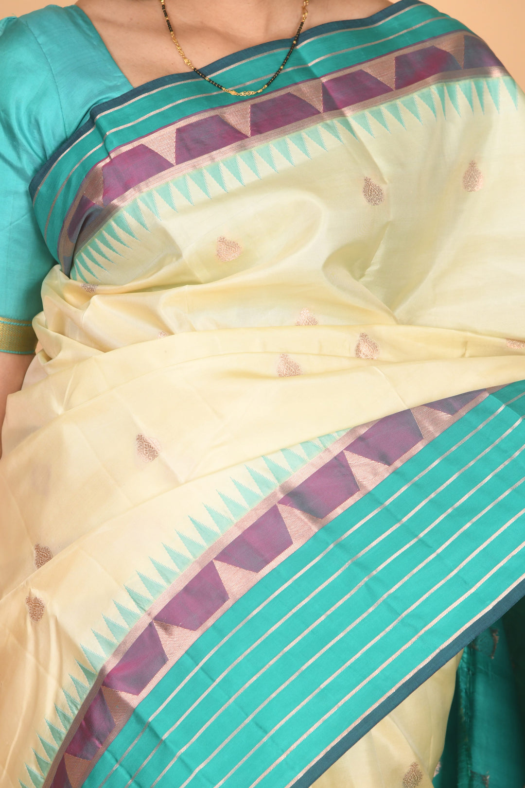 Offwhite and turquoise kanchi silk saree
