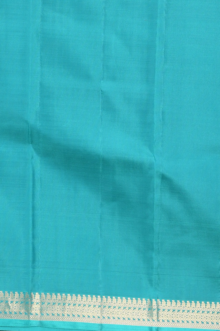 Dual tone orange and teal pure silk saree