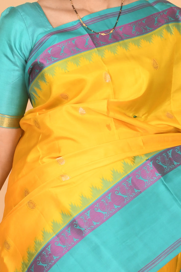 Yellow and turquoise kanchi silk saree