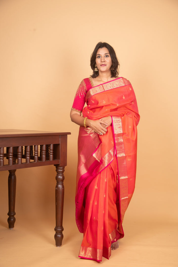 Lava orange and pink kanchi silk saree