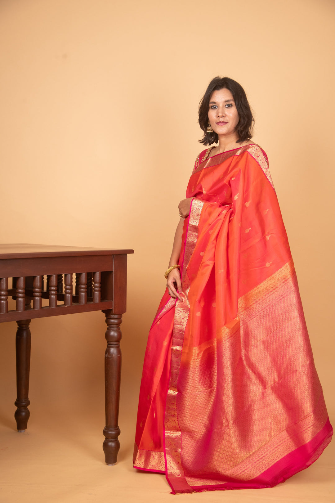 Lava orange and pink kanchi silk saree