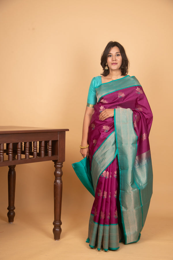 Purple and green turning kanchi silk saree