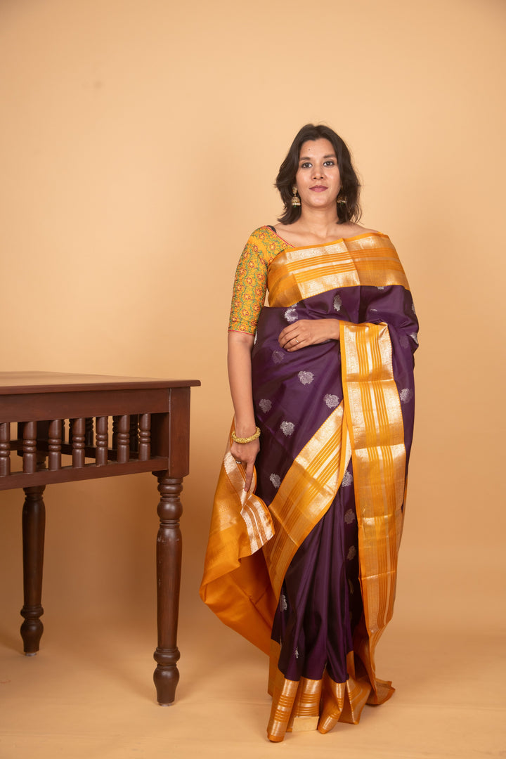 Purple and mustard korvai silk saree