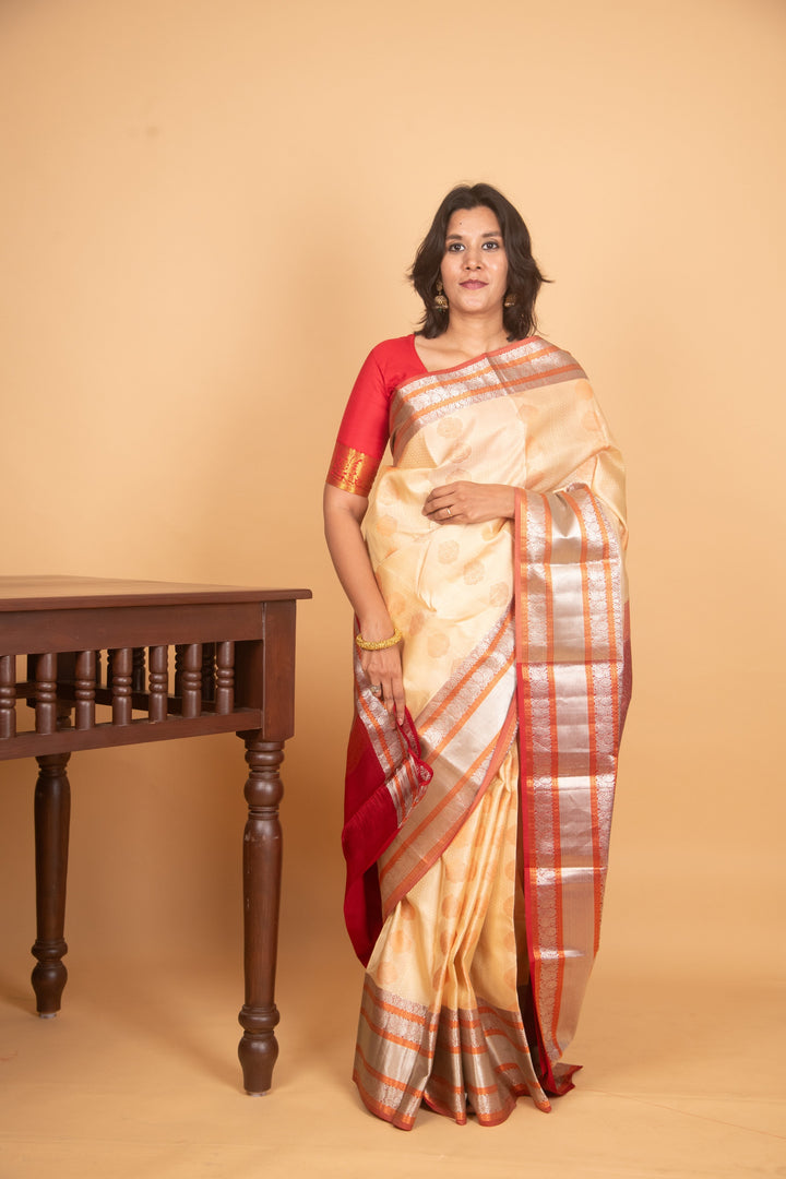 Cream and red kanchi silk saree