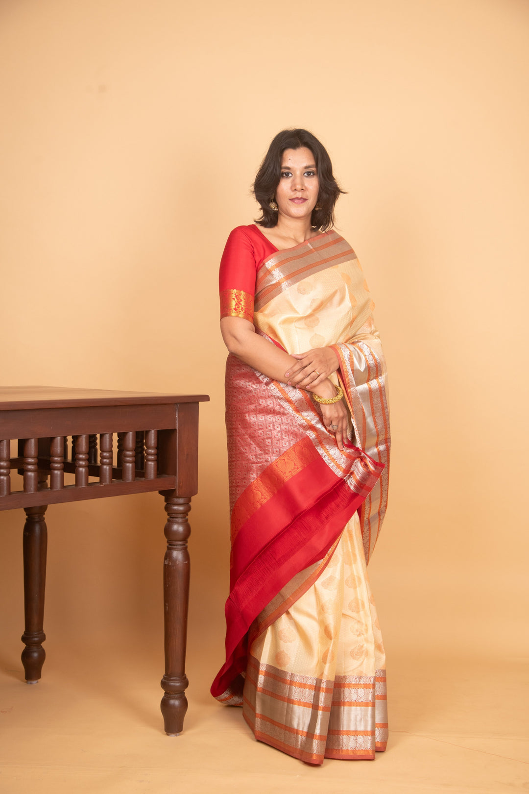Cream and red kanchi silk saree
